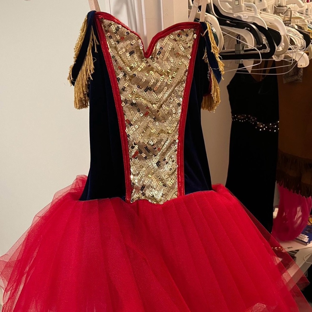 Curtain call costumes Red, gold, and blue ballet tutu